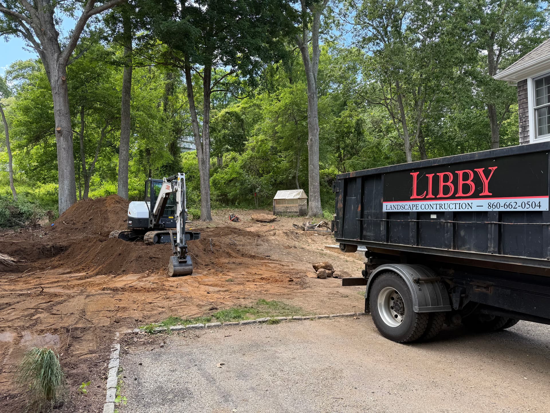 Gallery photos for Slope Excavation and Boulder Retaining Wall Base Build: Image #2
