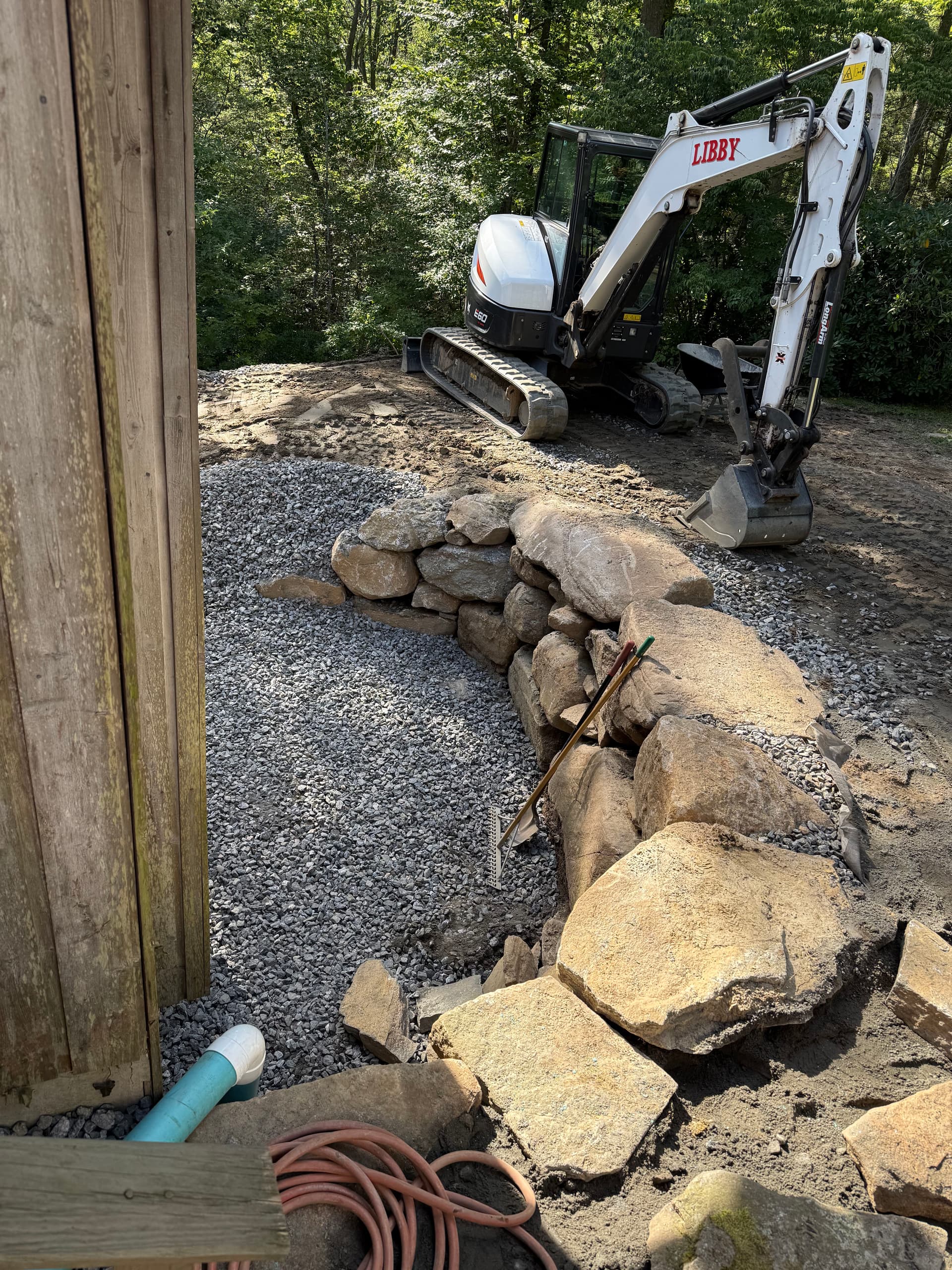 Gallery photos for Failing Timber Retaining Wall Rebuilt With Boulders and Proper Drainage: Image #3