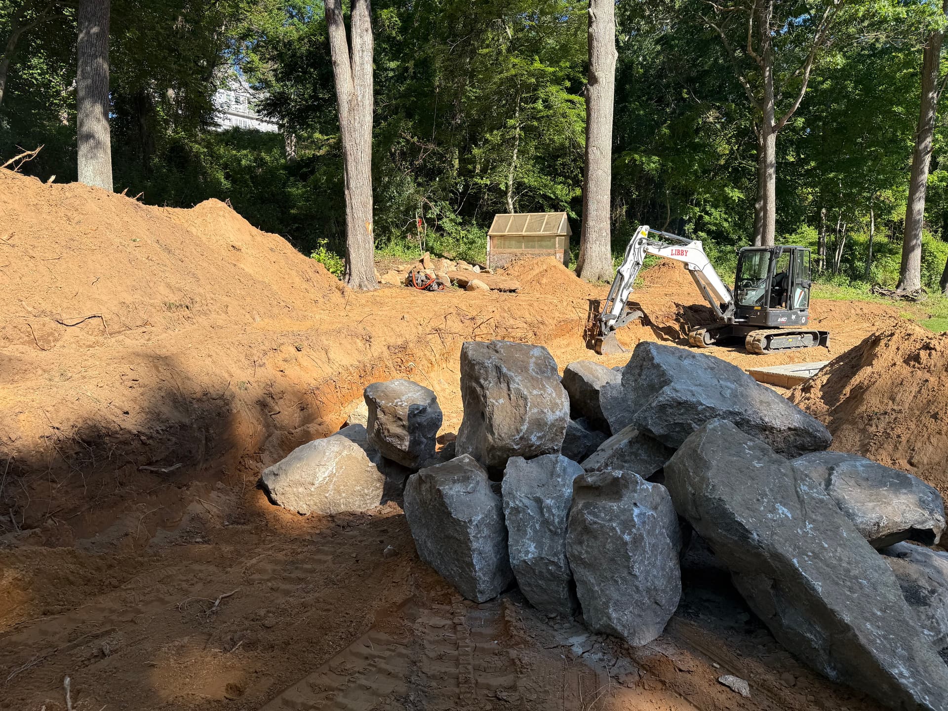 Gallery photos for Slope Excavation and Boulder Retaining Wall Base Build: Image #3