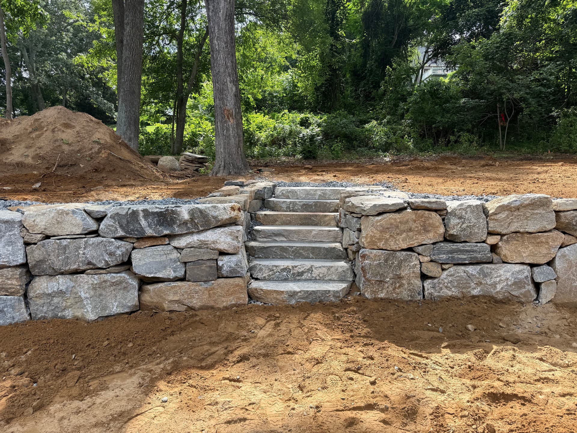 Gallery photos for Boulder Retaining Wall and Stone Steps Solve a Runoff Problem: Image #1