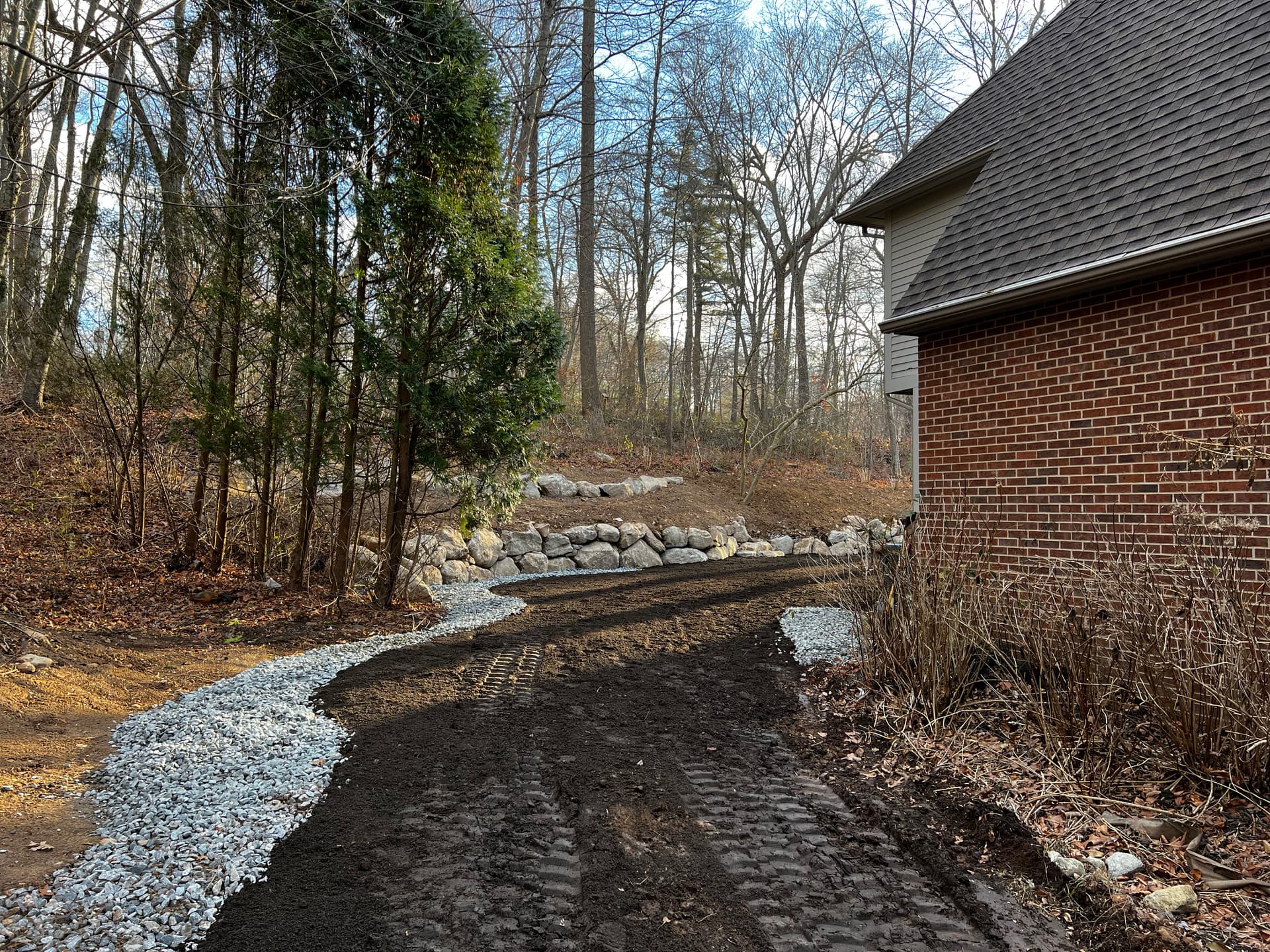 Gallery photos for Backyard Water Runoff Fix with Boulder Walls and a Fresh Pathway: Image #1