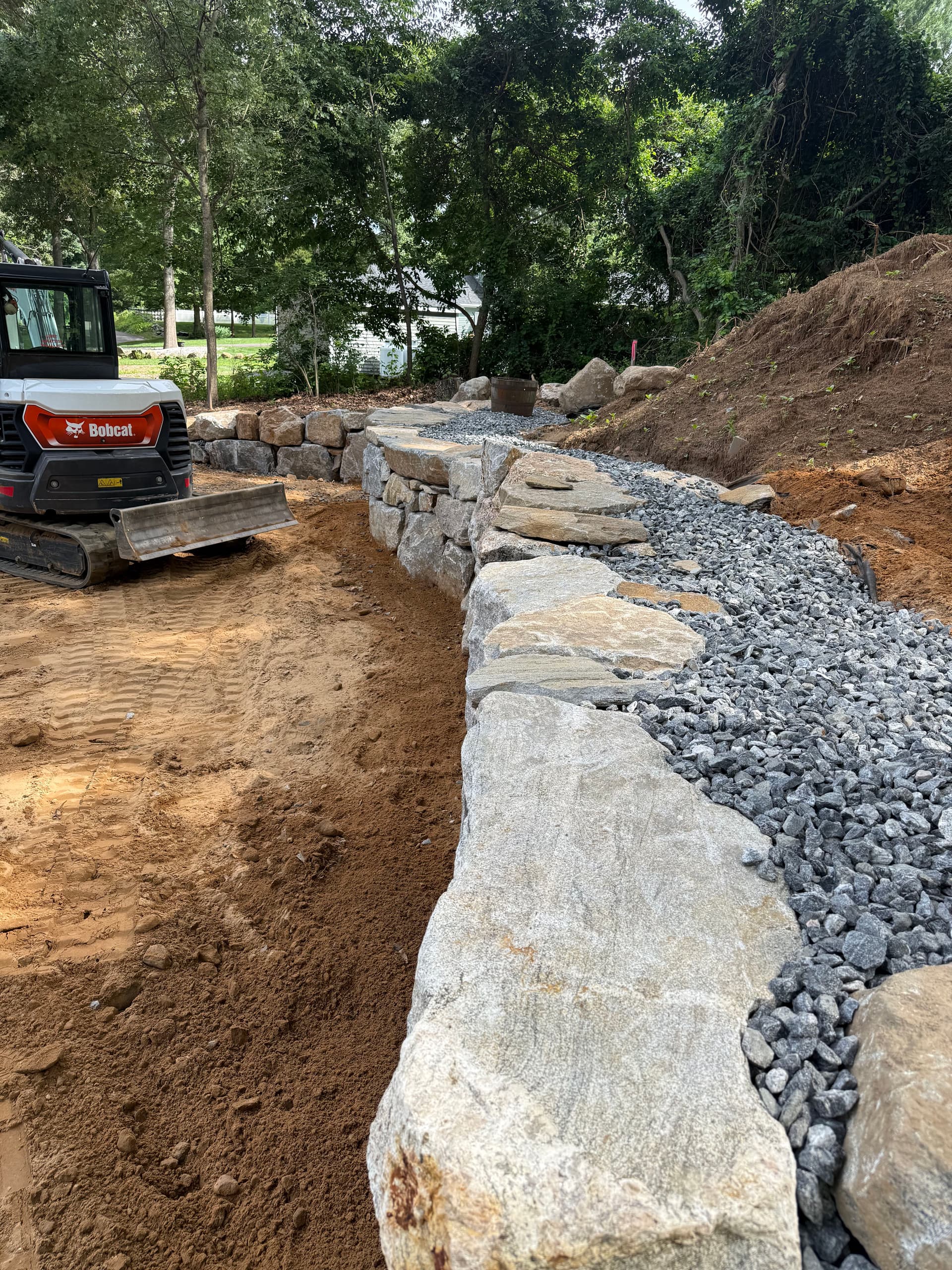Gallery photos for Boulder Retaining Wall and Stone Steps Solve a Runoff Problem: Image #3