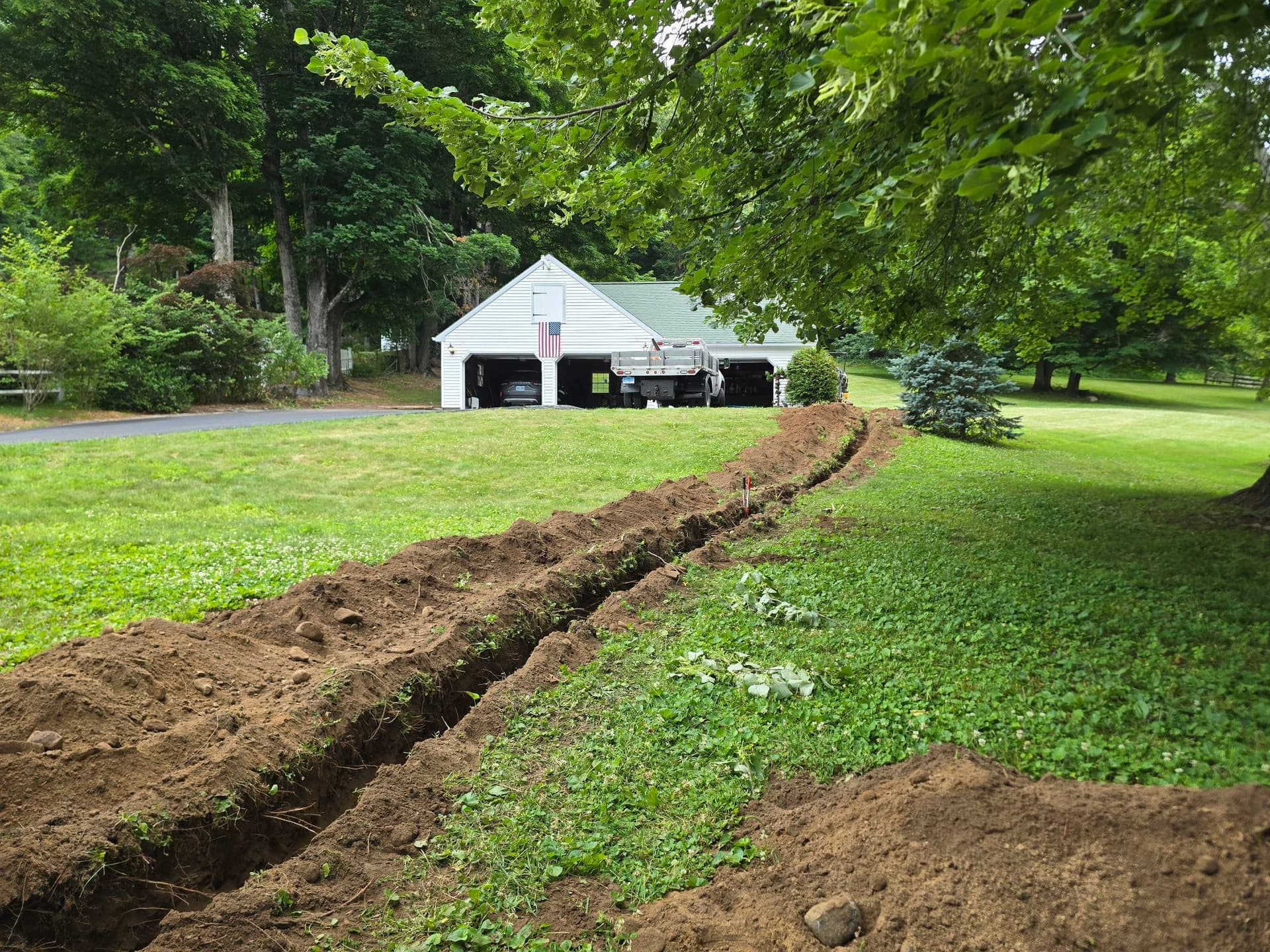 Clean Utility Trench Dug to Bring Power to a Detached Garage image