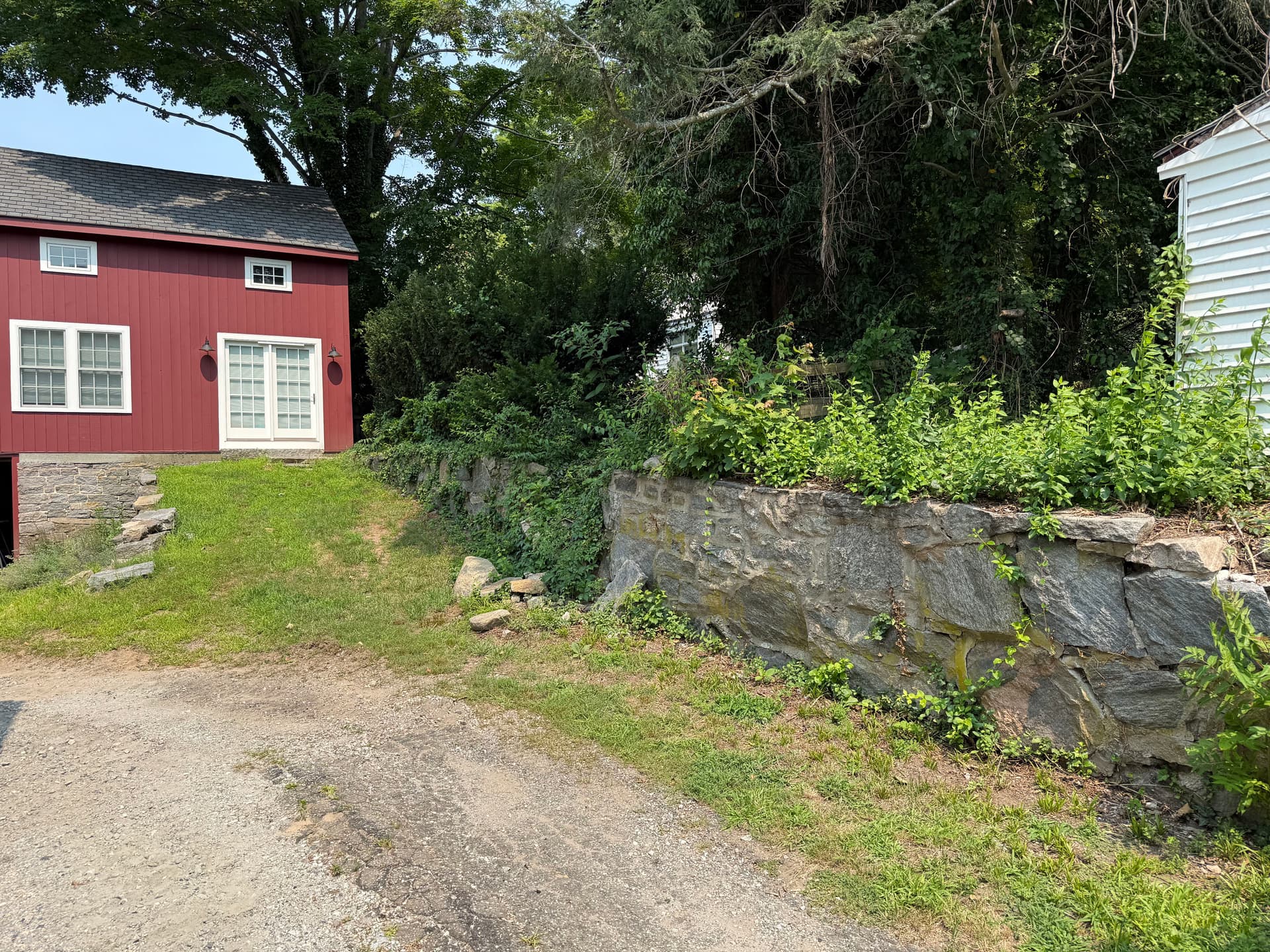 Failing Stone Retaining Wall Gets a Proper Rebuild image