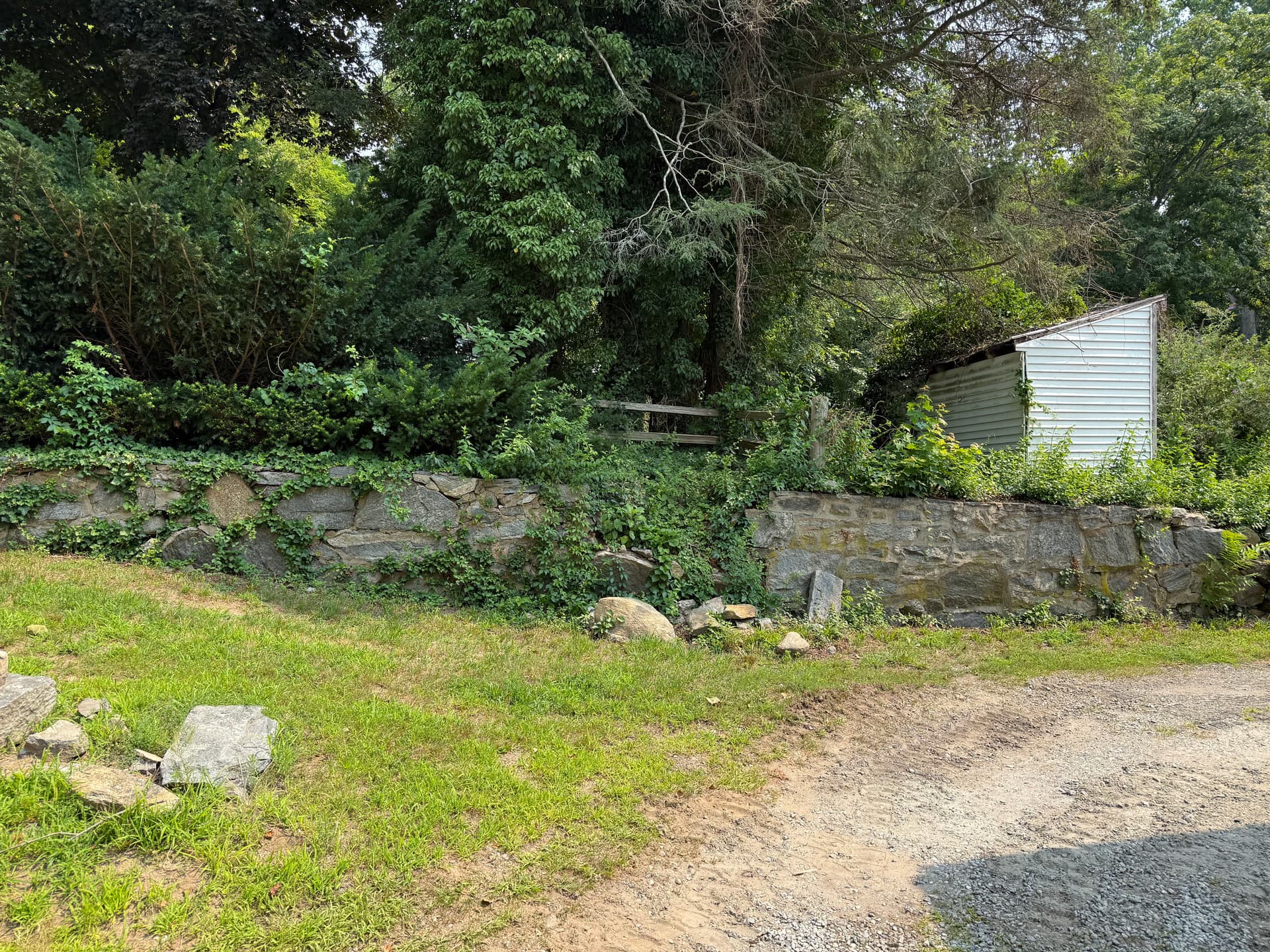 Gallery photos for Failing Stone Retaining Wall Gets a Proper Rebuild: Image #1