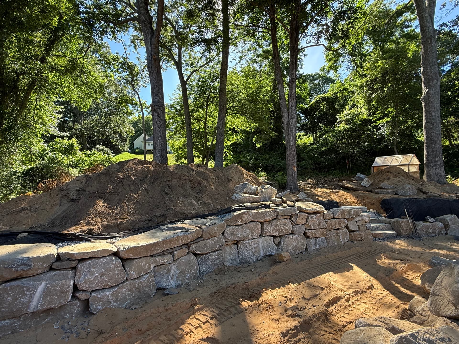 Gallery photos for Boulder Retaining Wall and Stone Steps Built for a Sloped Property: Image #2